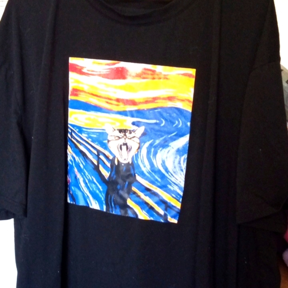 A Shein black shirt with a cat
